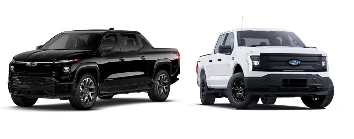 A black 2025 Chevy Silverado EV vs a white 2025 Ford F-150 Lightning.