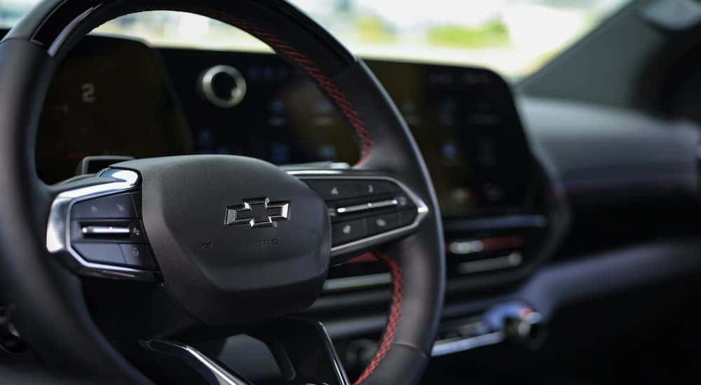 Close-up of the steering wheel in a 2025 Chevy Silverado EV.