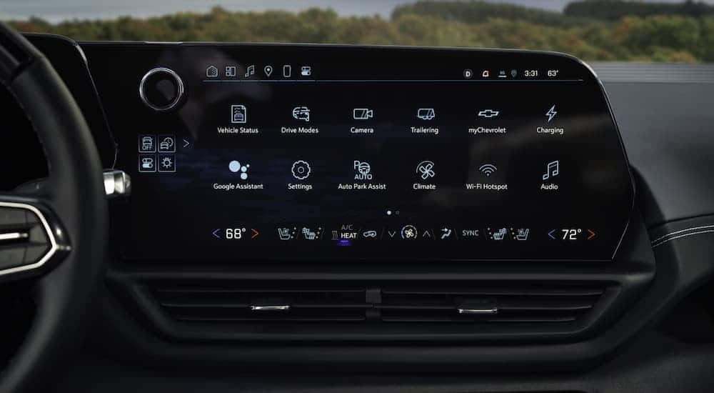 Infotainment display on a 2025 Chevy Silverado EV vs 2025 Tesla Cybertruck