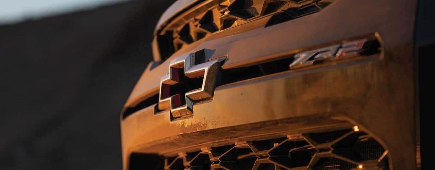 Close-up of the grille and Chevy emblem on a 2023 Chevy Colorado ZR2 for sale near Schenectady