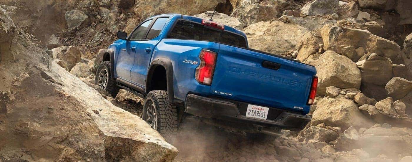 A blue 2024 Chevy Colorado ZR2 off-roading