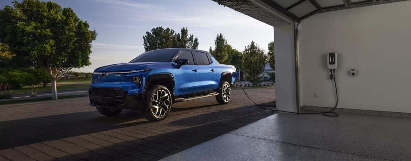 A blue 2024 Chevy Silverado EV for sale