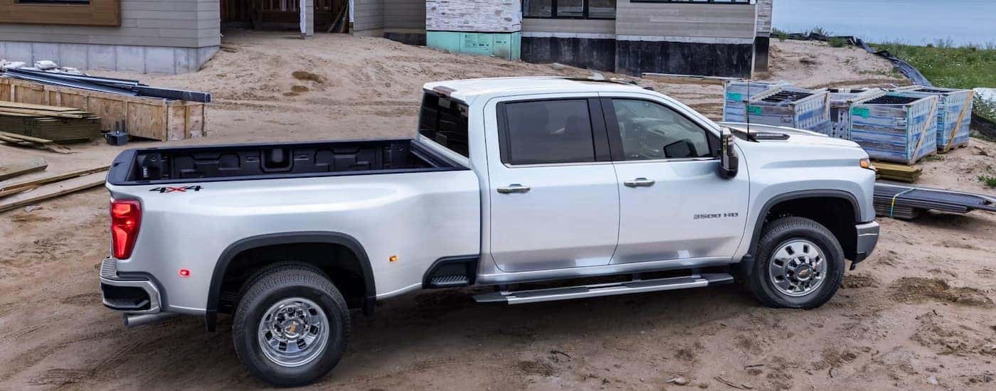 A white 2025 Chevy Silverado 3500 parked at a construction site