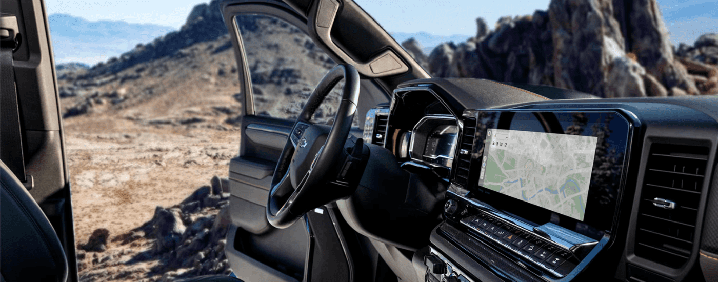Black interior and infotainment system in a 2025 Chevy Silverado 1500