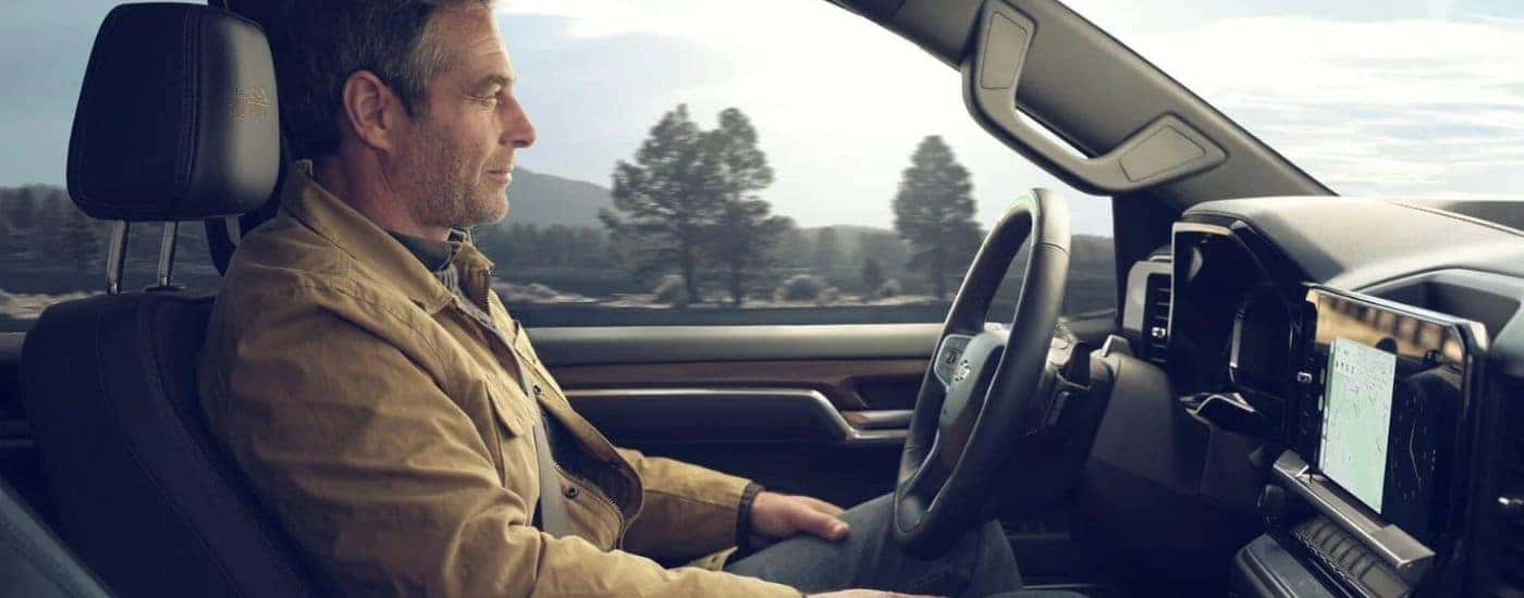 A man using SuperCruise on a 2024 Chevy Silverado 1500