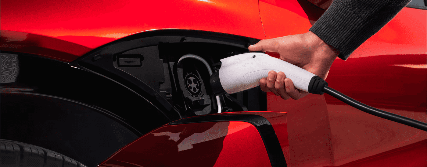 Red 2026 Chevy Blazer EV charging