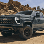 Green 2026 Chevy Silverado 2500 HD ZR2 parked off road