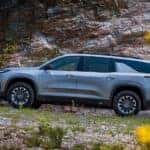 A silver 2026 Chevy Traverse off-road.