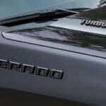 Silverado and Turbomax badging on a black 2026 Chevy Silverado 1500