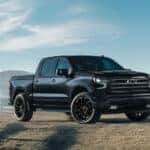 Black 2026 Chevy Silverado 1500 High Country on a ranch