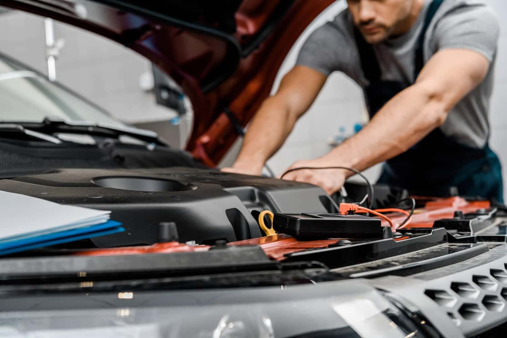 service tech checking battery