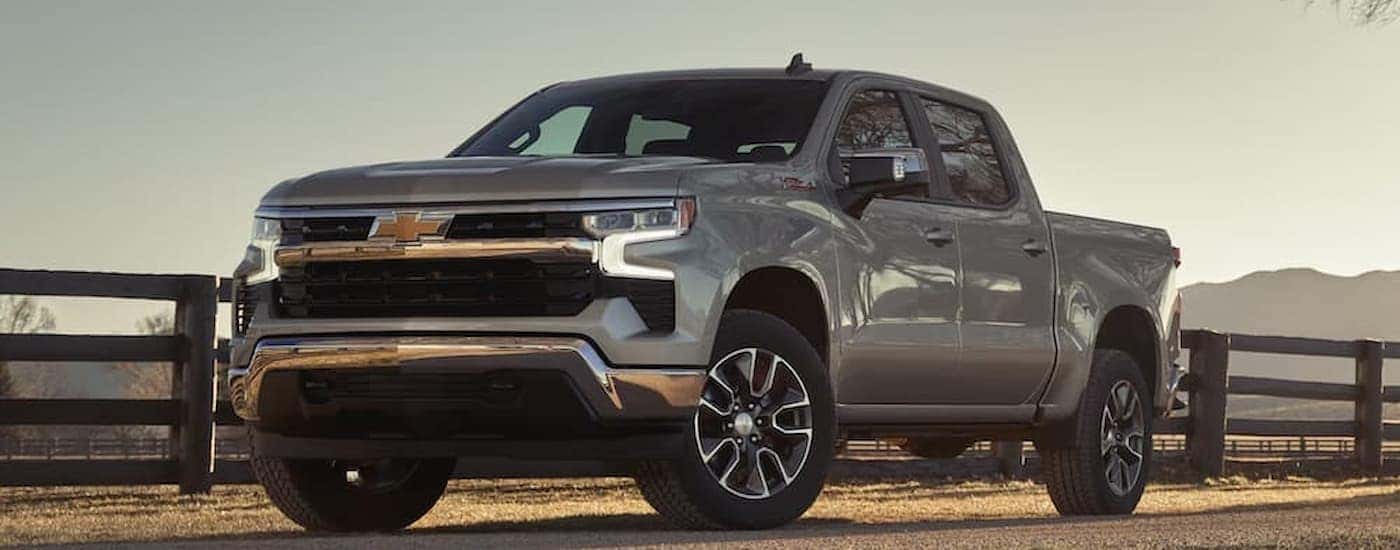A silver 2026 Chevy Silverado 1500 parked off-road