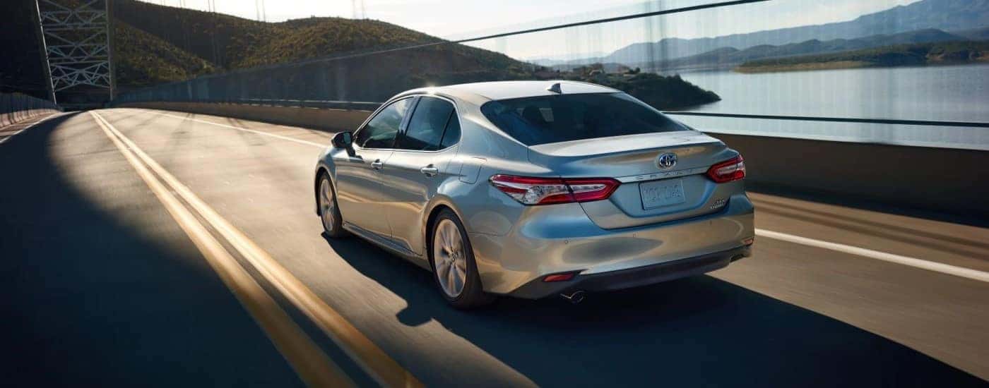 Silver 2020 Toyota Camry driving on a highway