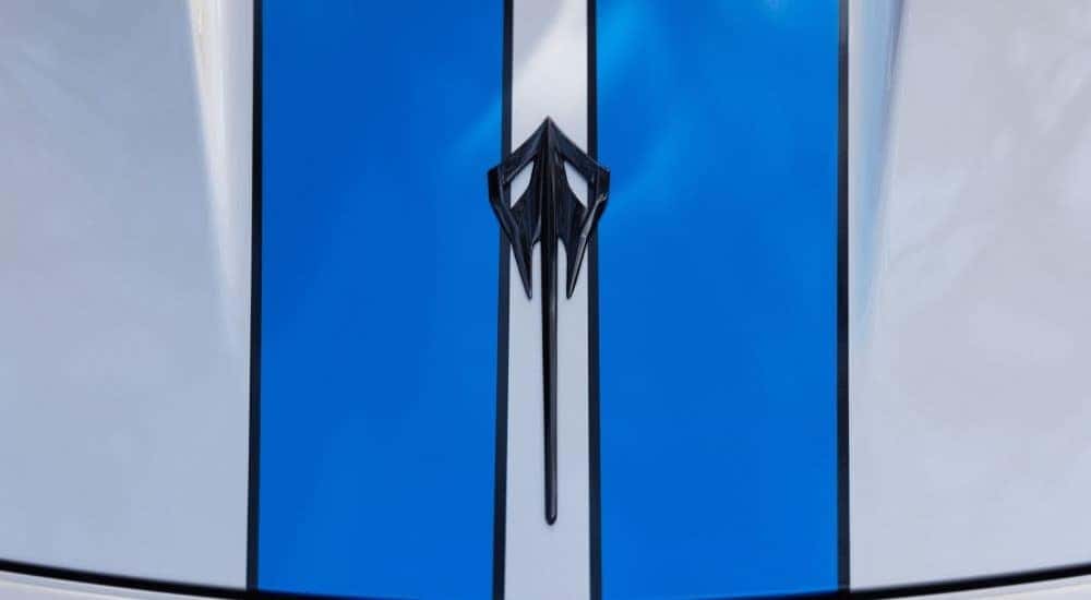 Stingray badge on a blue and silver 2026 Chevy Corvette E-Ray