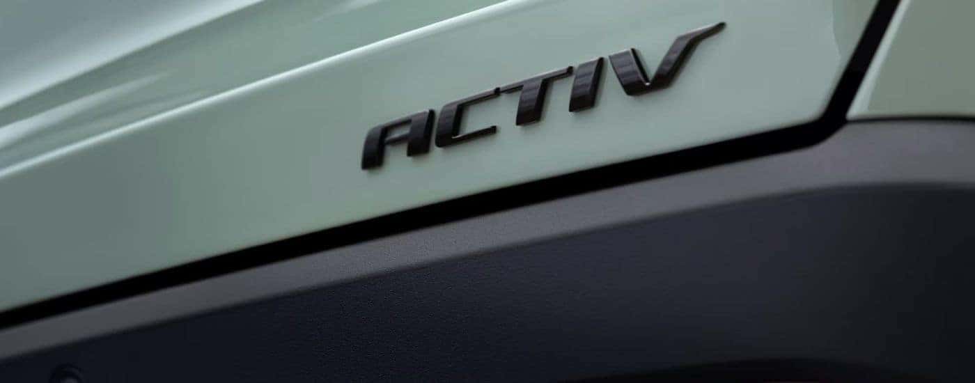 ACTIV badge on a green 2026 Chevy Equinox