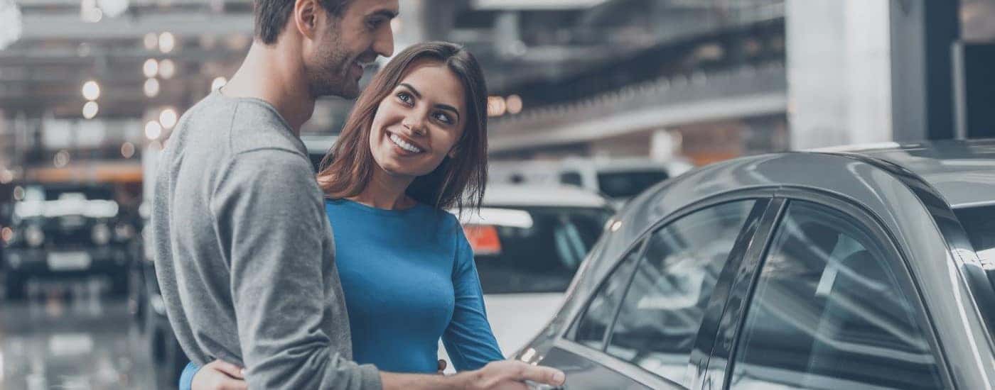 A couple is shown shopping for a vehicle at DePaula Chevy.