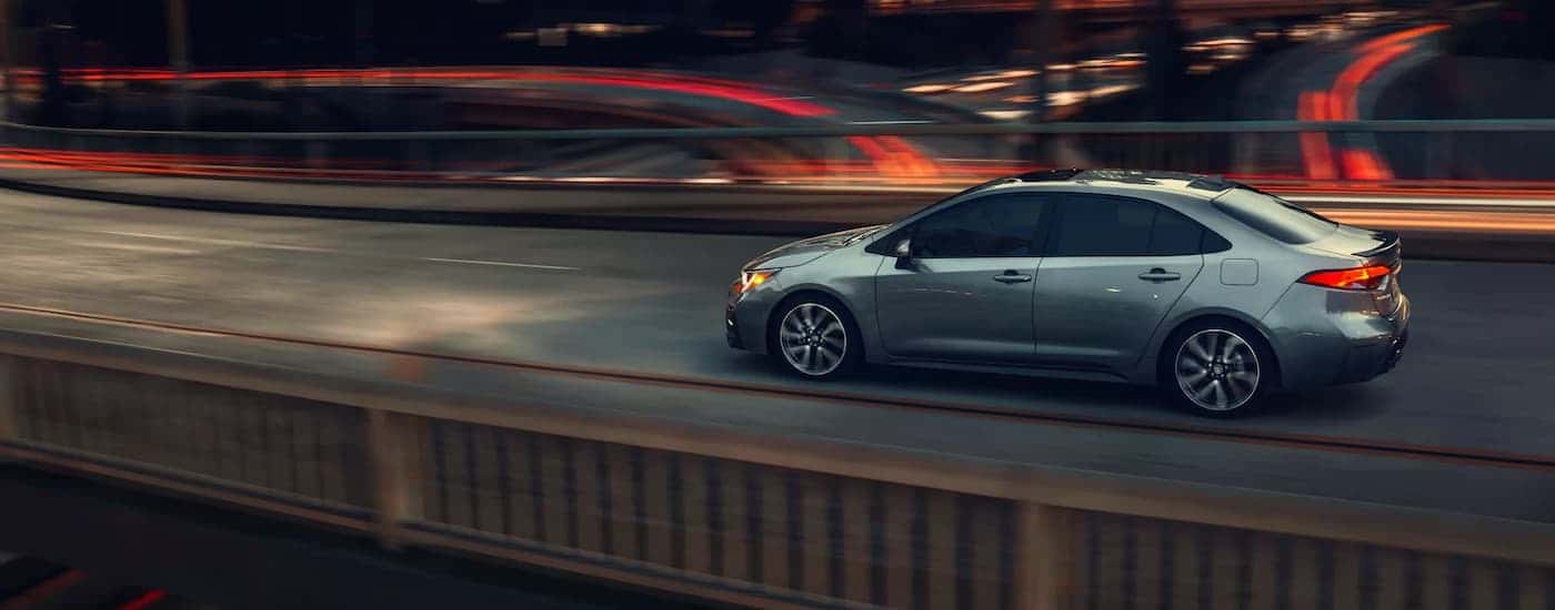 Silver 2022 Toyota Corolla driving on a highway