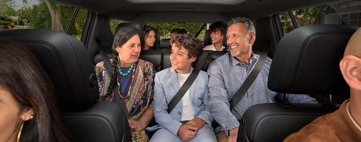 Passengers in a 2026 Chevy Traverse.