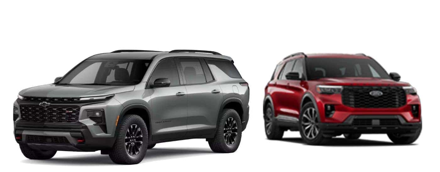 A silver 2026 Chevy Traverse vs a red 2026 Ford Explorer.