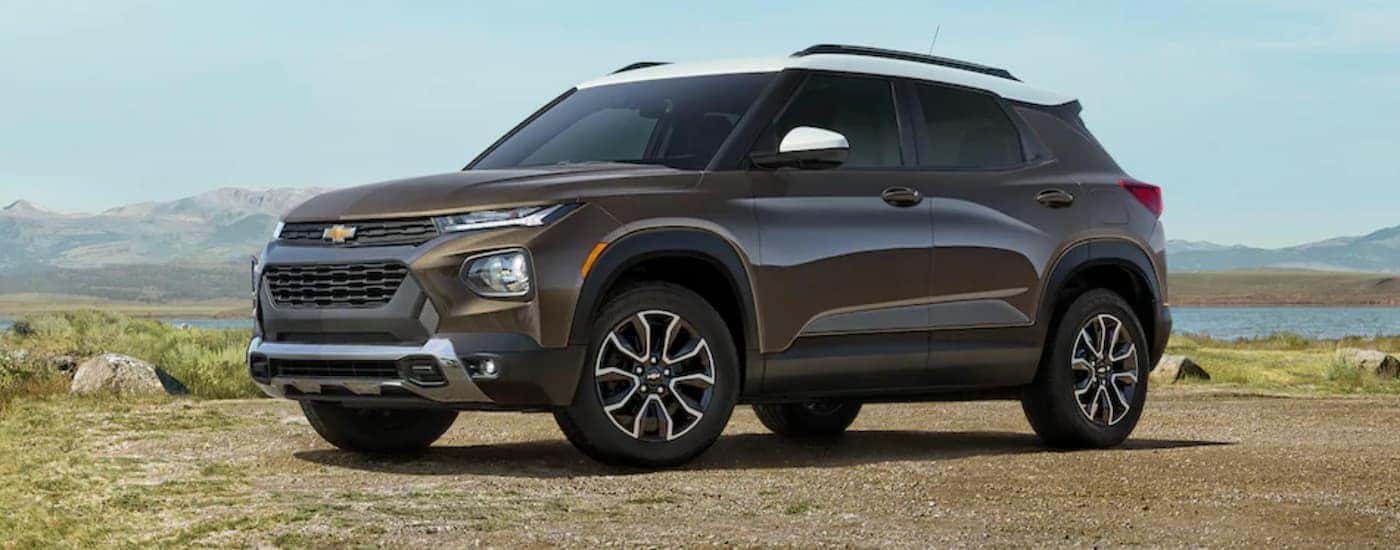 Brown 2021 Chevy Trailblazer parked near a lake.