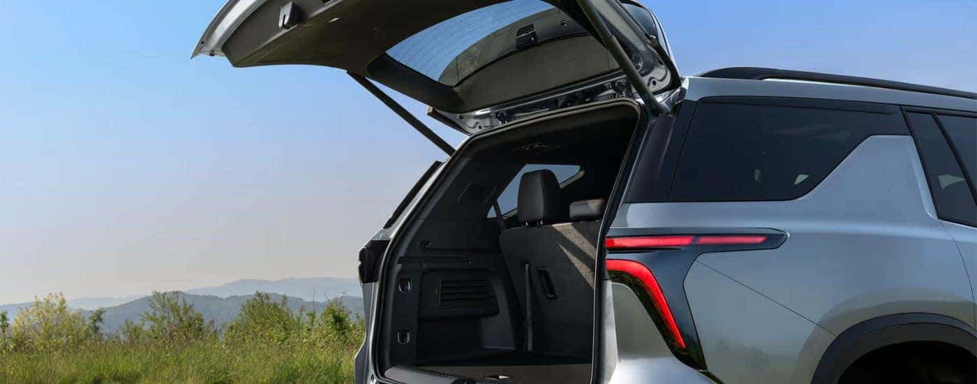 Grey 2026 Chevy Traverses with the cargo lift gate up.