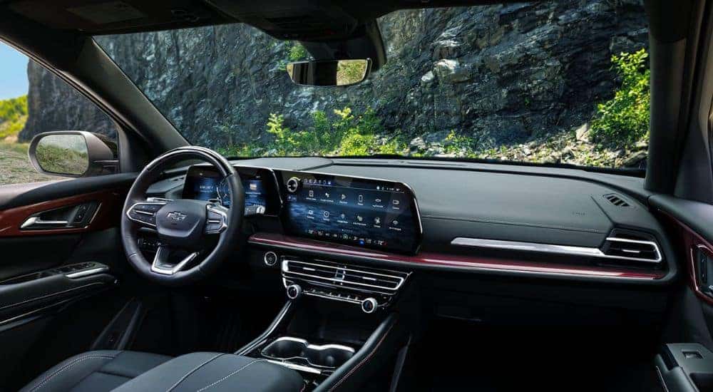 Interior of a 2026 Chevy Traverse Z71 infotainment display and steering wheel.