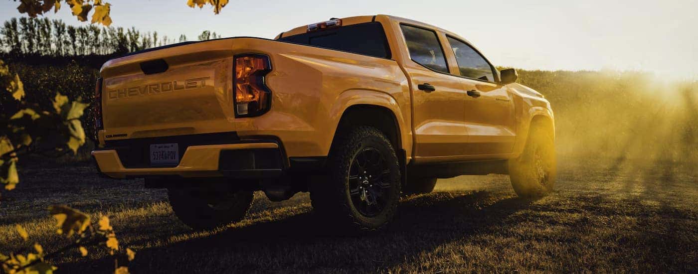A yellow 2026 Chevy Colorado parked off-road