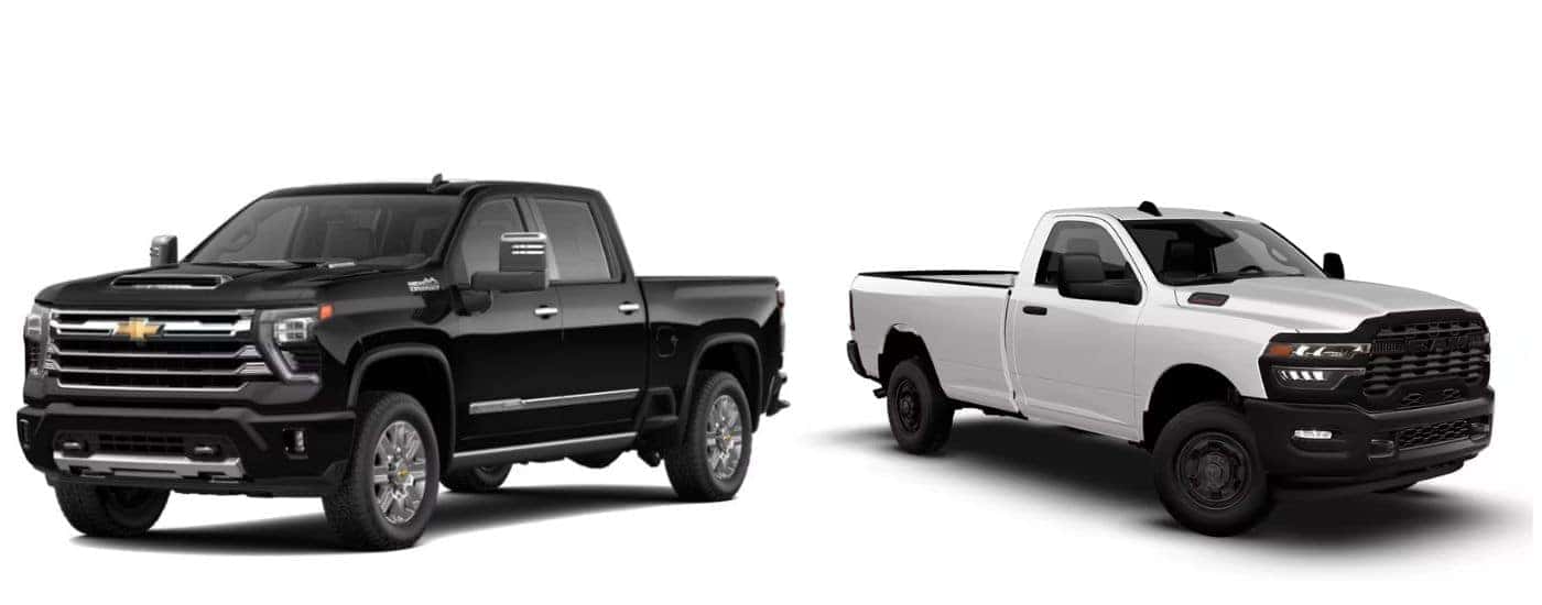 A black 2026 Chevy Silverado 2500 HD vs a white 2026 Ram 2500