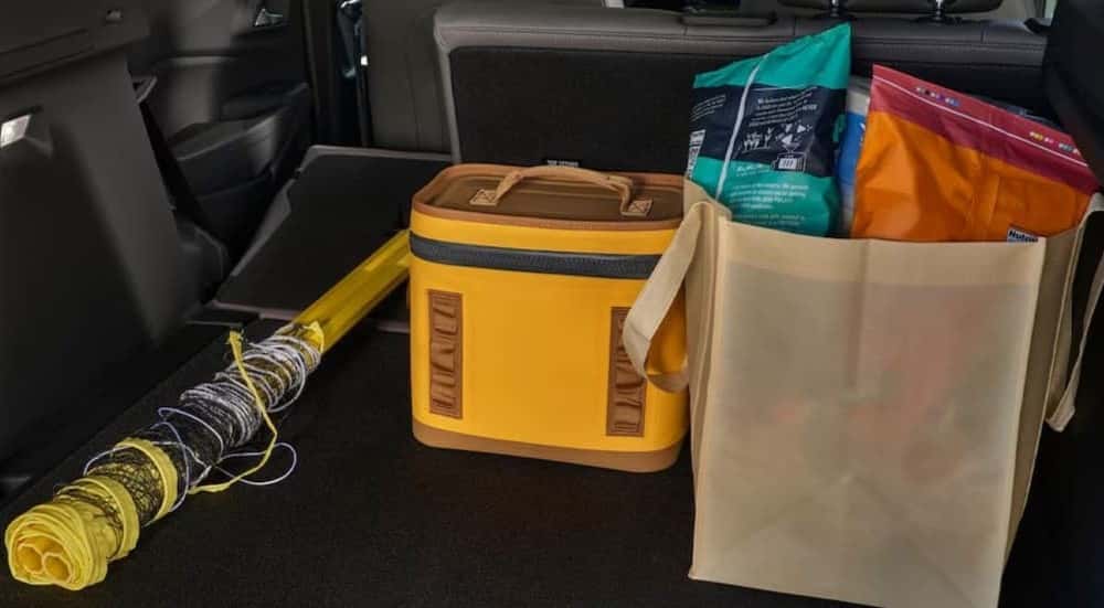 Items in the rear cargo area in a 2026 Chevy Trax.