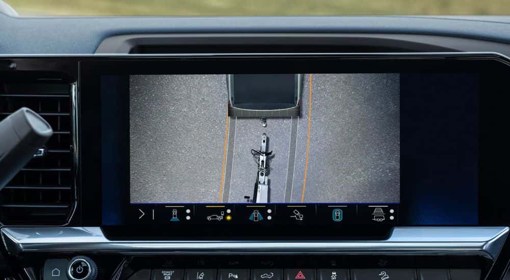 Rear Top-Down camera view showing the rear of truck and trailer on a 2026 Chevy Silverado 2500 HD.
