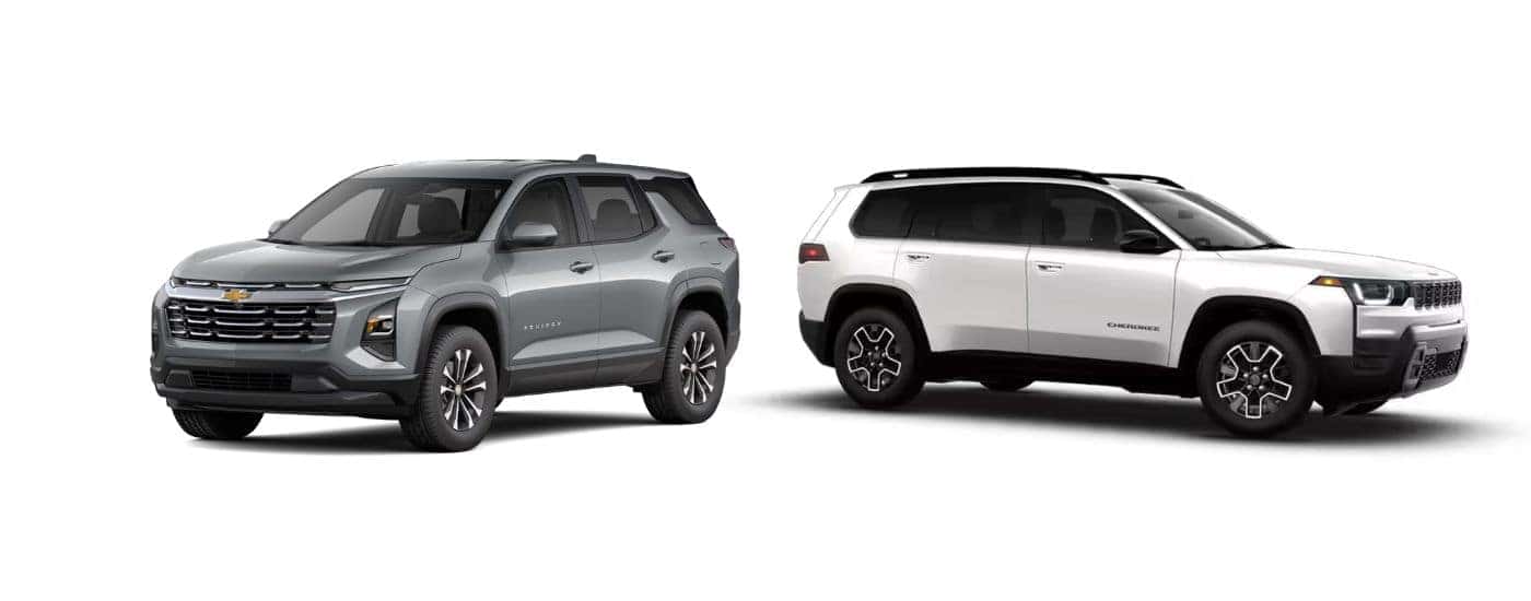 Grey 2026 Chevy Equinox angled left and a white 2026 Jeep Cherokee angled right.