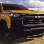 A yellow 2026 Chevy Colorado parked offroad.