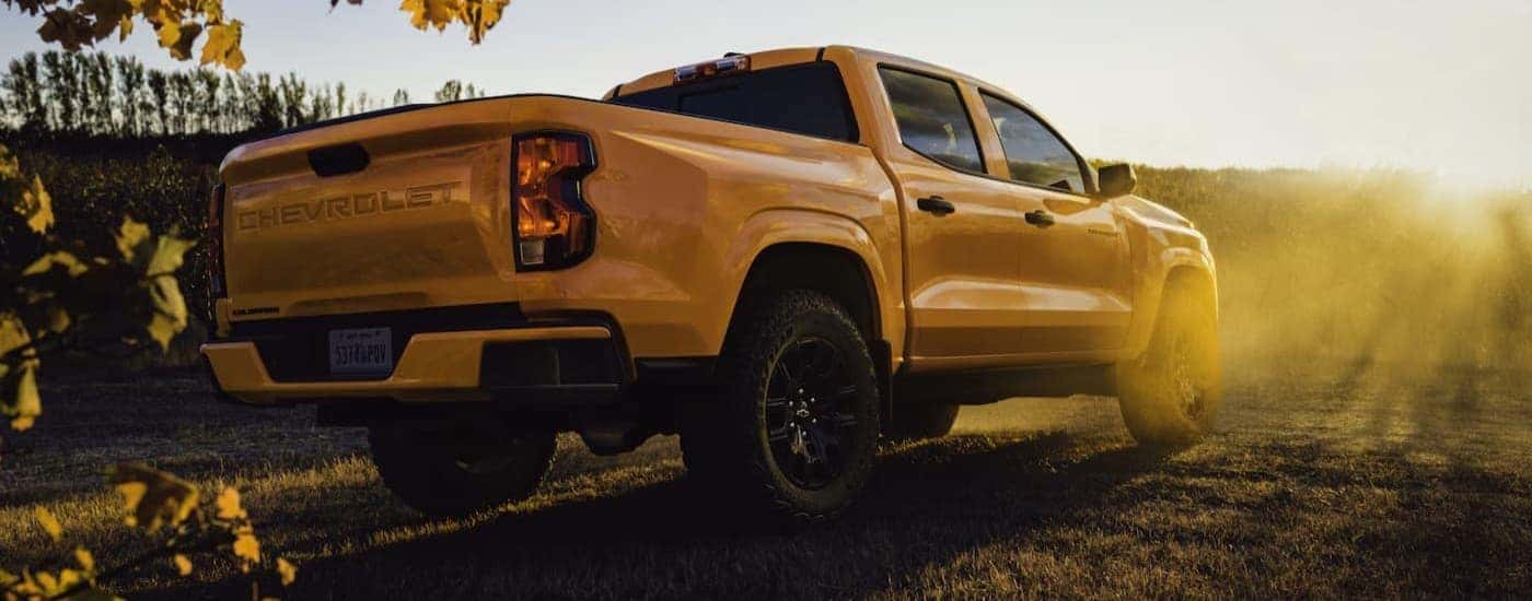 A yellow 2026 Chevy Colorado parked offroad.