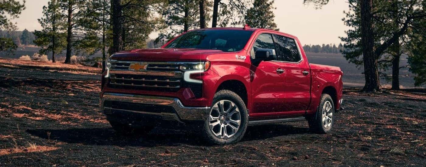 Red 2026 Chevy Silverado 1500 Z71 parked off-road.