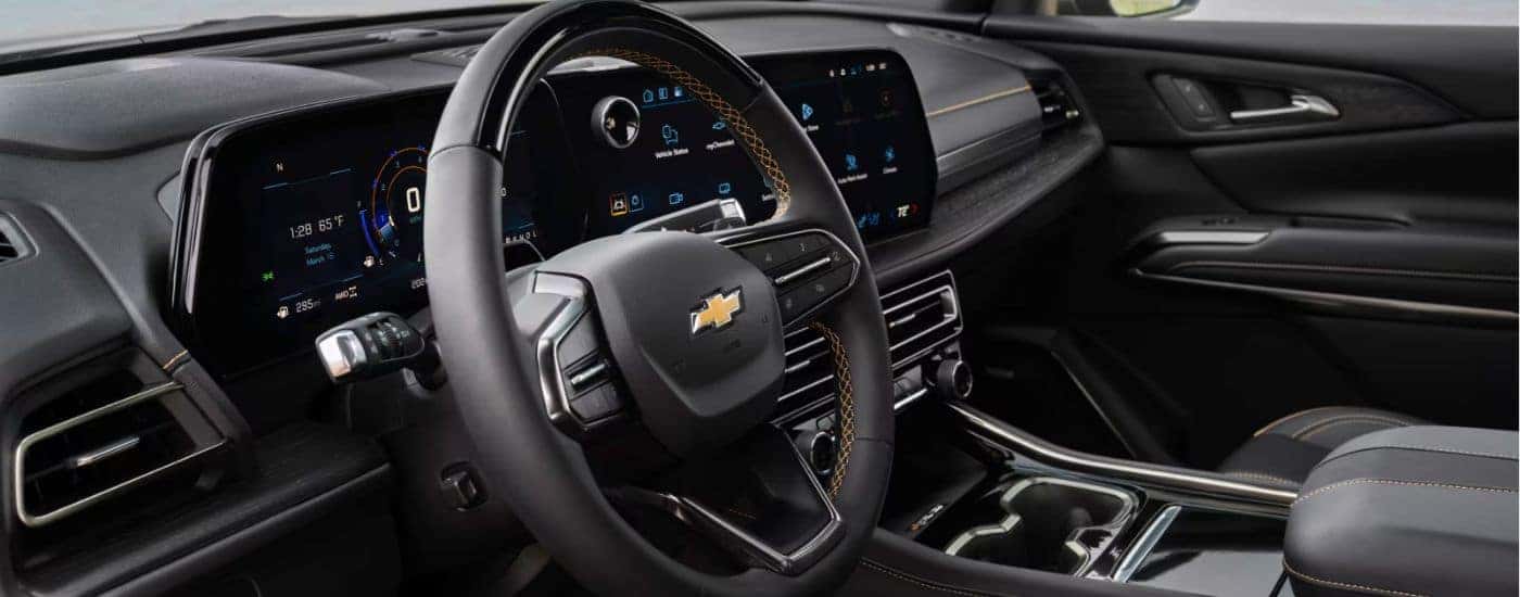 The digital cluster and infotainment display on a 2027 Chevy Traverse.