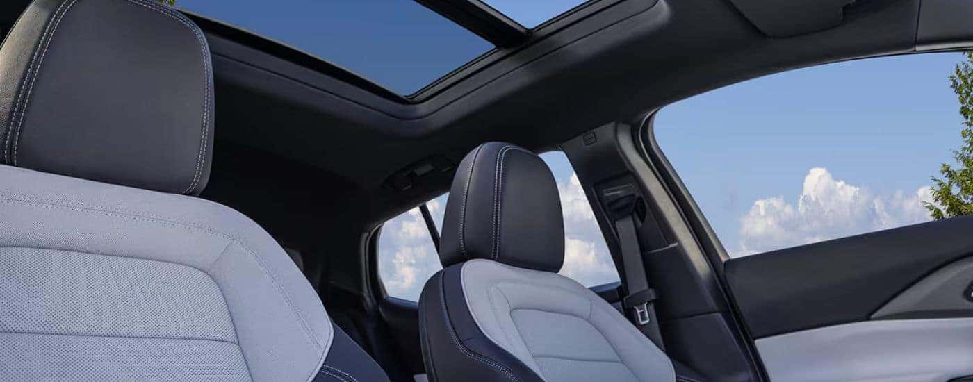 Light and dark gray seating and moonroof in a 2027 Chevy Equinox EV.