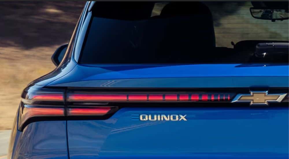 Rear gate badging on a blue 2027 Chevy Equinox EV LT 2.