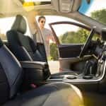 Man entering Camry interior