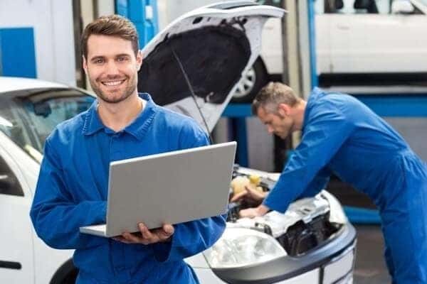 Mechanic Working on Computer