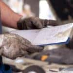 mechanic holding a service order