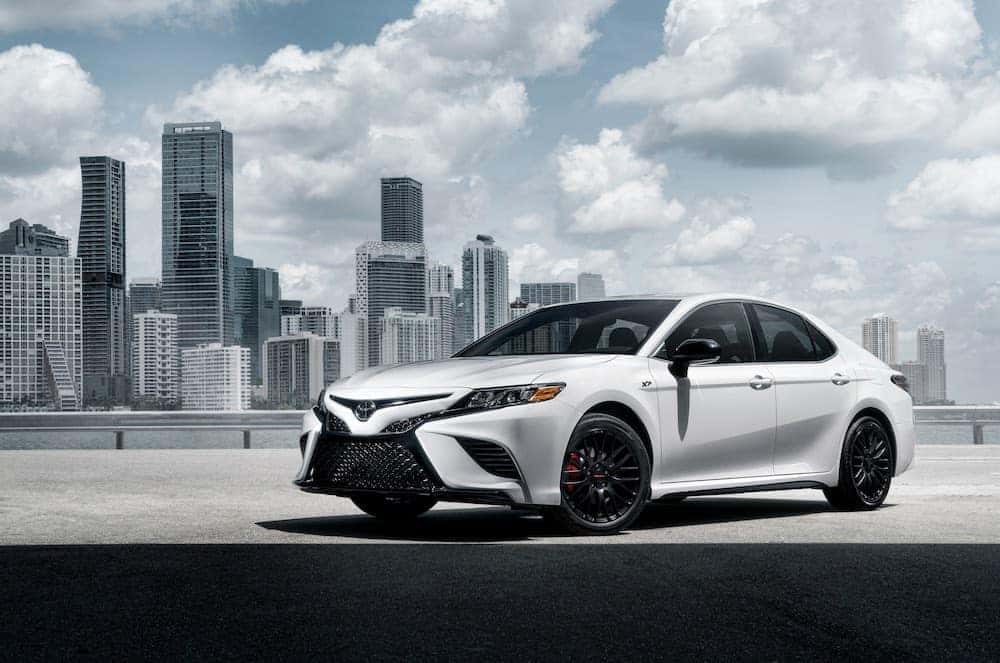 Toyota Camry XP in front of city
