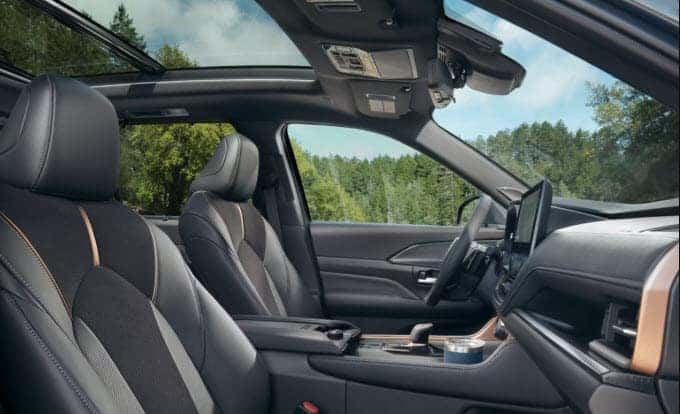 Toyota Grand Highlander interior with panoramic roof and premium materials