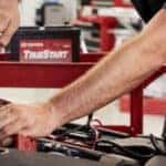 Toyota technician performing under hood service at Earl Stewart Toyota
