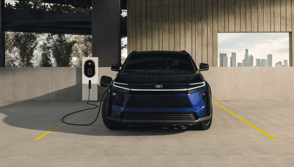 2026 Toyota bZ plugged into a DC fast charger with NACS port