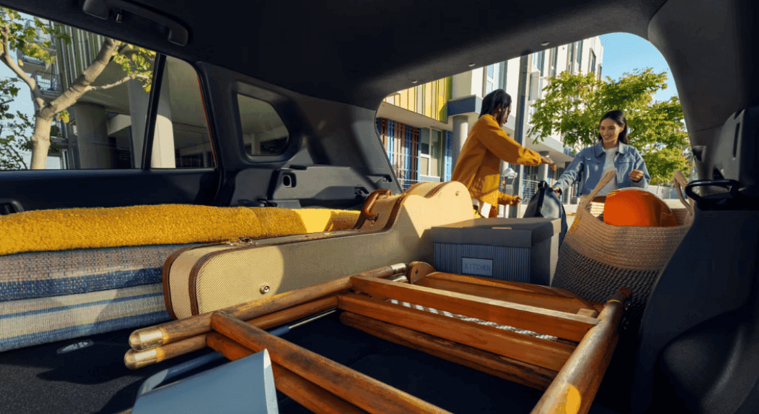 2026 Toyota Corolla Cross Hybrid cargo area with rear seats folded