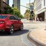 Red 2018 Honda Accord Making a Right Turn Around a Curve