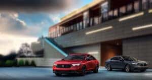 2025-Honda-Accord-two-accords-one-red-and-one-gray-on-a-concrete-platform-at-the-bottom-of-the-stairs--1-