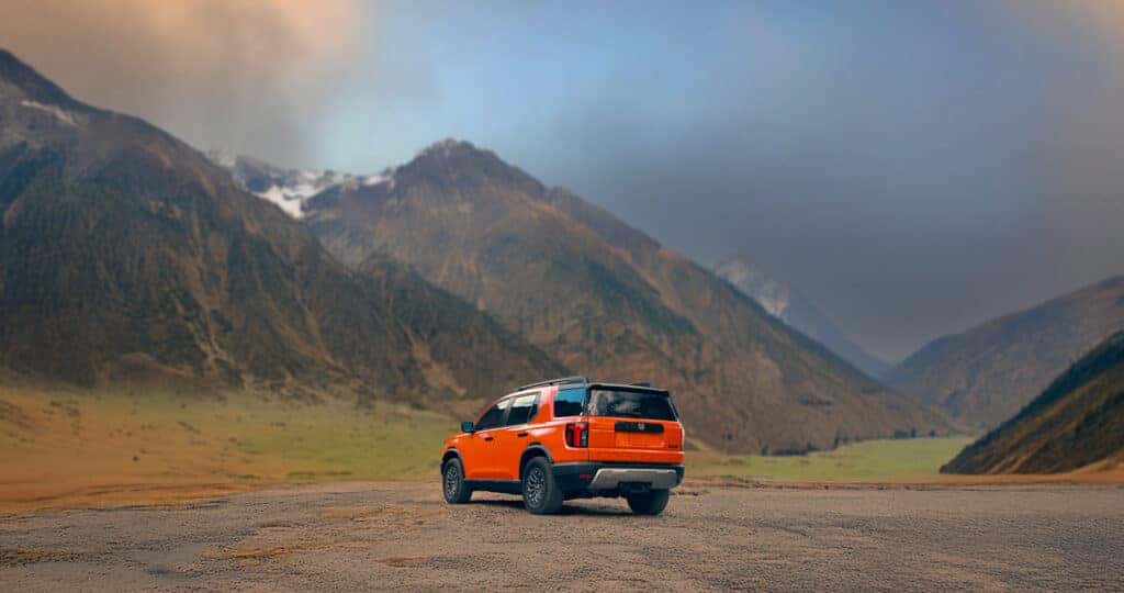 2026 Honda Passport TrailSport parked in a mountain valley