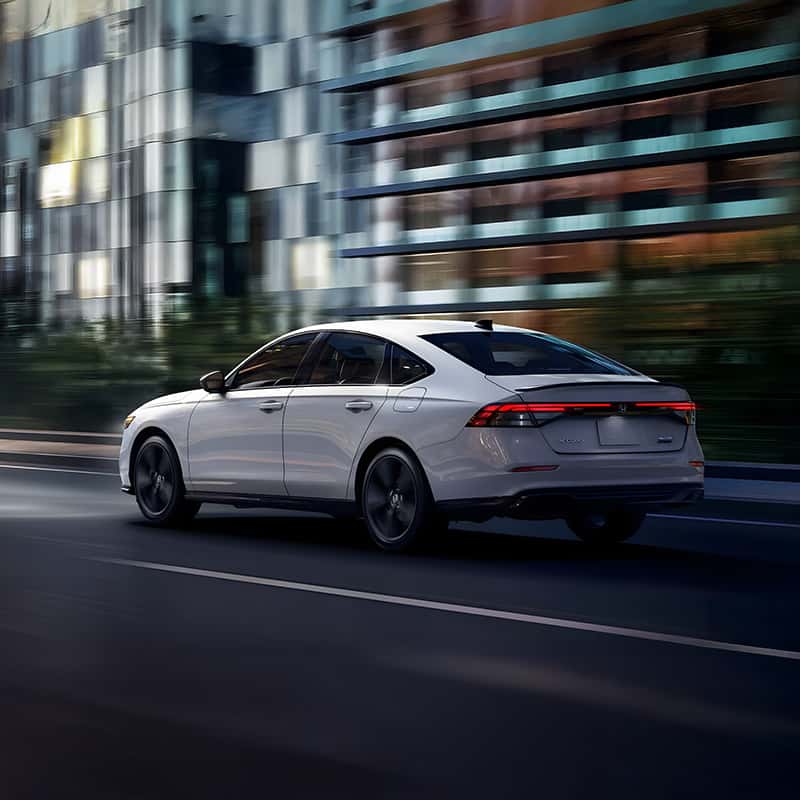 2025 Honda Accord Hybrid trims Sport-L Hybrid shown in Platinum White Pearl