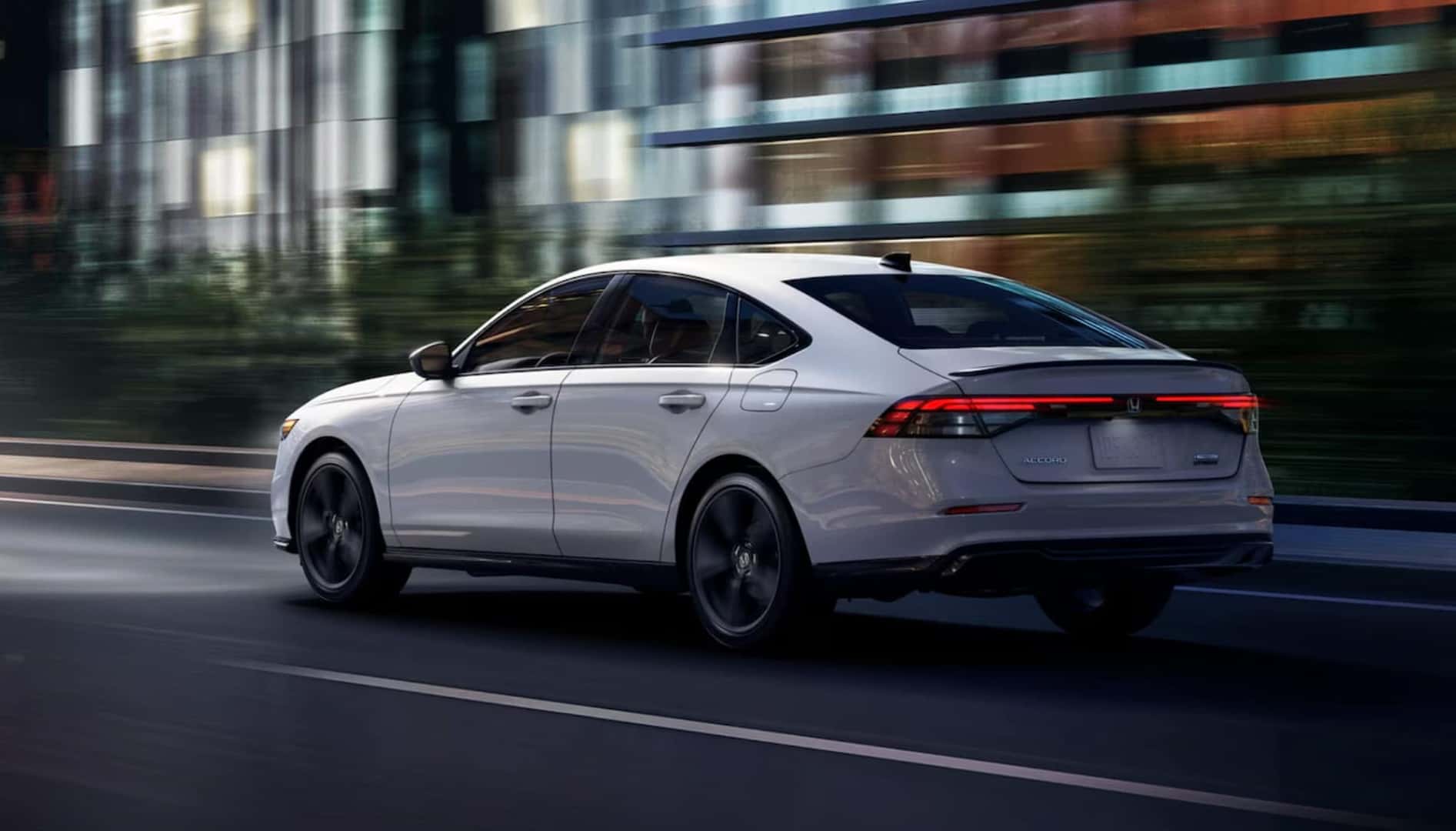 2025 Honda Accord Hybrid trims Sport-L Hybrid shown in Platinum White Pearl.
